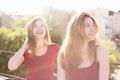 Portrait of two girlfriends on the roof Royalty Free Stock Photo