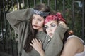 Portrait of two girls outdoors. The concept of difficult teenagers, bad students Royalty Free Stock Photo