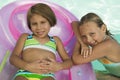 Portrait Of Two Girls In Swimming Pool Royalty Free Stock Photo