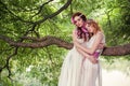 Portrait of two girls in white dresses.