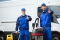 Portrait Of Two Happy Male Janitors Royalty Free Stock Photo