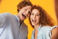 Portrait of two happy people man and woman laughing and taking s Royalty Free Stock Photo