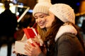 Portrait of happy women exchanging christmas presents. Holiday people christmas happiness concept Royalty Free Stock Photo