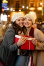 Portrait of happy women exchanging christmas presents. Holiday people christmas happiness concept Royalty Free Stock Photo