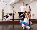 Portrait of two little girls and choreography teacher