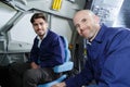 portrait two men in aircraft simulator Royalty Free Stock Photo