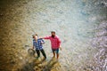 Portrait of two men on holiday. Fishing background. Two male friends dressed in shirts fishing together with net and rod Royalty Free Stock Photo