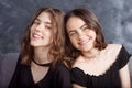 Portrait of two natural  smiling teenage girls. Close up lifestyle portrait of two young girls best friends Royalty Free Stock Photo