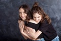 Portrait of two natural  smiling teenage girls. Lifestyle portrait of two young girls best friends.  Beautiful teen girls having Royalty Free Stock Photo