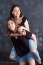 Portrait of two natural  smiling teenage girls. Lifestyle portrait of two young girls best friends.  Beautiful teen girls having Royalty Free Stock Photo