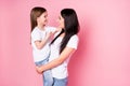 Portrait of two nice attractive lovely cute sweet careful cheerful cheery friendly sisters mom carrying daughter Royalty Free Stock Photo