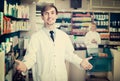 Portrait of two pharmacists working in modern farmacy Royalty Free Stock Photo