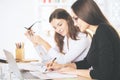 Pretty businesswomen doing paperwork Royalty Free Stock Photo