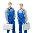 Portrait Of Two Repair Men Holding Tool Boxes Royalty Free Stock Photo