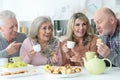 Portrait of two senior couples having breakfast Royalty Free Stock Photo