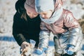 Portrait of two sisters of different ages on a winter walk in a snowy park Royalty Free Stock Photo