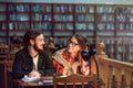 Portrait of Couple of Students in Library Royalty Free Stock Photo