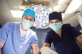 Portrait of two surgeons over the operating table Royalty Free Stock Photo