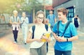 Two teenage students going to college on autumn day Royalty Free Stock Photo