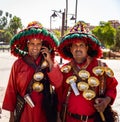 portrait of two water sellers wearing traditional costume Royalty Free Stock Photo