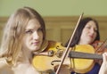 Portrait of two women playing music Royalty Free Stock Photo