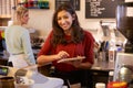 Portrait Of Two Women Running Coffee Shop Together Royalty Free Stock Photo
