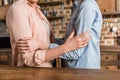 Portrait of two women, senior and young hugging