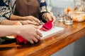 Portrait of two women slice a dragon fruit