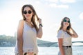 Portrait of two young beautiful girls on the beach Royalty Free Stock Photo