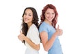 Portrait of two young female friends gesturing thumbs up Royalty Free Stock Photo