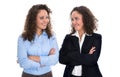 Portrait of two young isolated business woman - real twins. Royalty Free Stock Photo