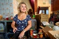 Portrait of Ukrainian volunteer women collecting foods in humanitarian aid bag