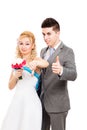 Unhappy bride and happy groom Royalty Free Stock Photo