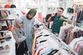 unhappy daughter while shopping new clothes with mother