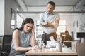 Sad sick lady listening reproaches of boss Royalty Free Stock Photo