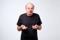 Portrait of unhappy man with a red nose celebrating all fools day Royalty Free Stock Photo