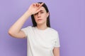 Portrait of unhappy sad young brunette woman suffering from headache, frustrated dizzy flu-sick girl feeling unwell, fever and Royalty Free Stock Photo