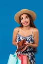 Portrait of unhappy young woman looking in her wallet in shopping center, spent too much, not enough cash, lost money Royalty Free Stock Photo
