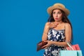 Portrait of unhappy young woman looking in her wallet in shopping center, spent too much, not enough cash, lost money Royalty Free Stock Photo