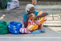 Portrait of an unidentified homeless woman in the street of the sacred city of Rameshwaram, India. Royalty Free Stock Photo