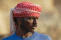 Portrait of unidentified man wearing traditional head scarf in Aden, Yemen.