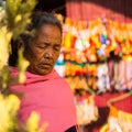 Portrait of unidentified old woman near stupa Boudhanath Royalty Free Stock Photo