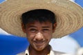 Portrait of unidentified young man wearing a straw hat in Taizz, Yemen.