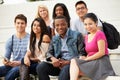 Portrait Of University Students Outdoors On Campus