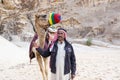 Portrait of unknown bedouin with camel