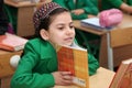 Portrait of an unknown schoolgirl in the classroom.