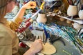 Female Artist Shaping Glass in Flame Royalty Free Stock Photo