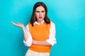 Portrait of unsatisfied confused unhappy girl with straight hairdo wear white shirt offended resent isolated on