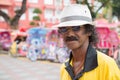 Portrait of an unusually flamboyant Malay man