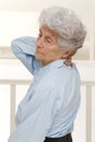 Portrait of an unwell senior woman with neck pain Royalty Free Stock Photo